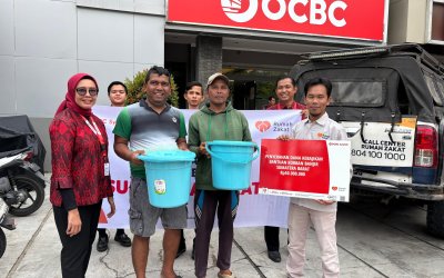 Bank OCBC Syariah Salurkan Bantuan Bencana Agam Bersama Rumah Zakat